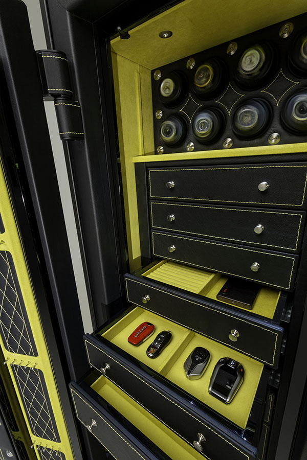 6018 bespoke leather safe interior with watch winders and jewelry drawers with yellow ultrasuede and custom inserts